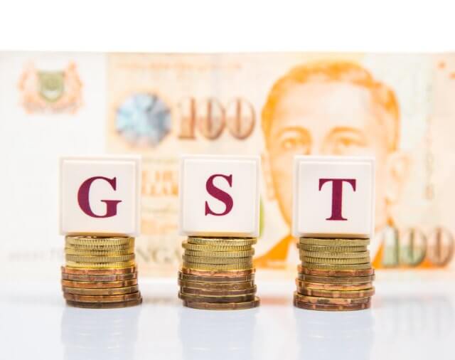 What is compulsory registration under GST in Singapore?